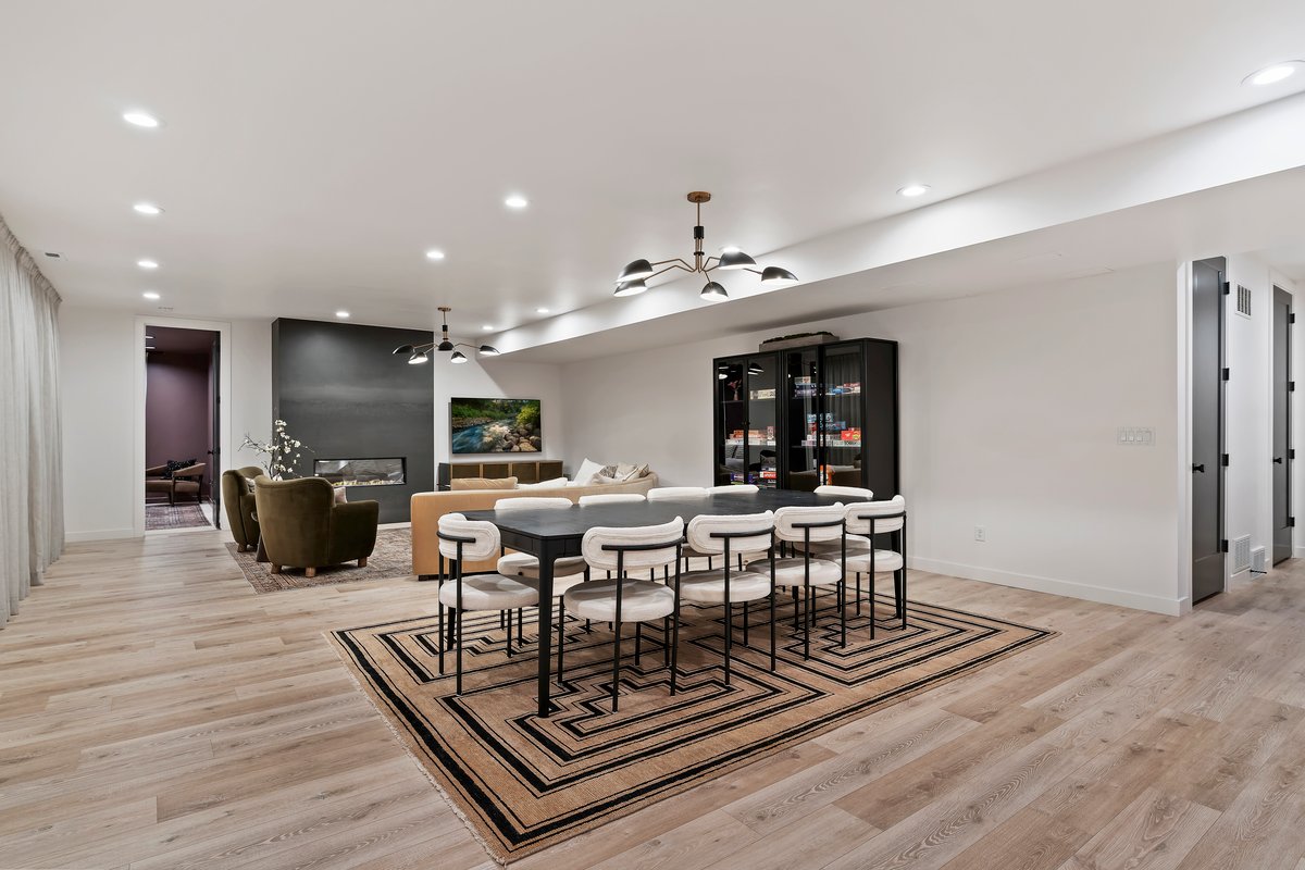 Dining area featuring light wood-style floors and recessed lighting