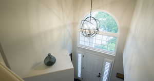 Foyer featuring suspended lighting