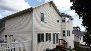 Rear view of house with a gate