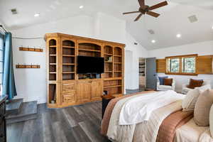 Bedroom with vaulted ceiling, recessed lighting, dark wood-style floors, and ceiling fan