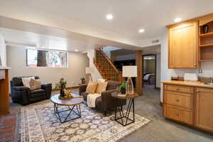 Living room featuring recessed lighting and light colored carpet