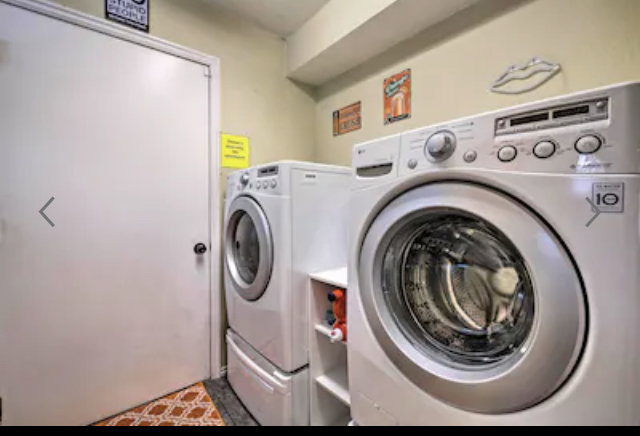 Laundry area featuring separate washer and dryer