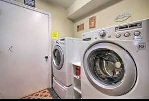 Laundry area featuring separate washer and dryer
