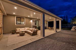 Covered back patio features recessed lighting, gas fireplace, eve outlets and outlets on the north and south pillar.