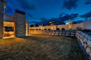 Landscaping lighting illuminates fruit trees