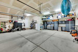 3 car garage has built in work station, floating workbench, bike racks, ski racks and ski boot locker with interior plugs for boot dryers.