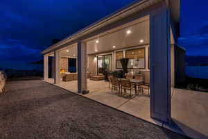 Covered back patio features recessed lighting, gas fireplace, eve outlets and outlets on the north and south pillar.