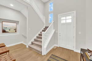 Spacious entry with extra wide stairways