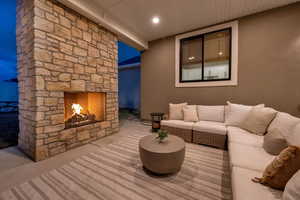 Covered back patio features recessed lighting, gas fireplace, eve outlets and outlets on the north and south pillar.