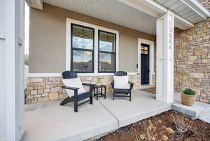 Front porch hangout space to meet your new neighbors on!