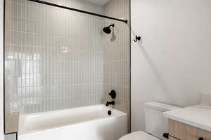 Full bathroom featuring tub / shower combination and vanity
