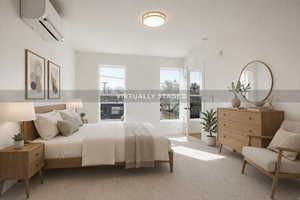 Bedroom featuring a wall mounted mini split and light colored carpet