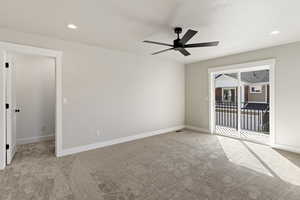 Unfurnished room featuring ceiling fan, light carpet, and recessed lighting