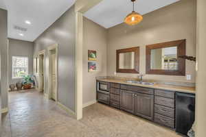 Bathroom featuring vanity and recessed lighting