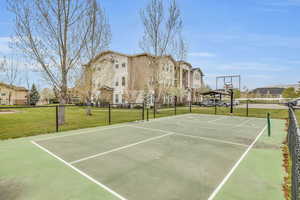 View of basketball court featuring community basketball court, a residential view, and a gazebo