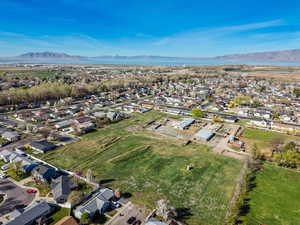 Aerial view of residential area featuring a mountain backdrop