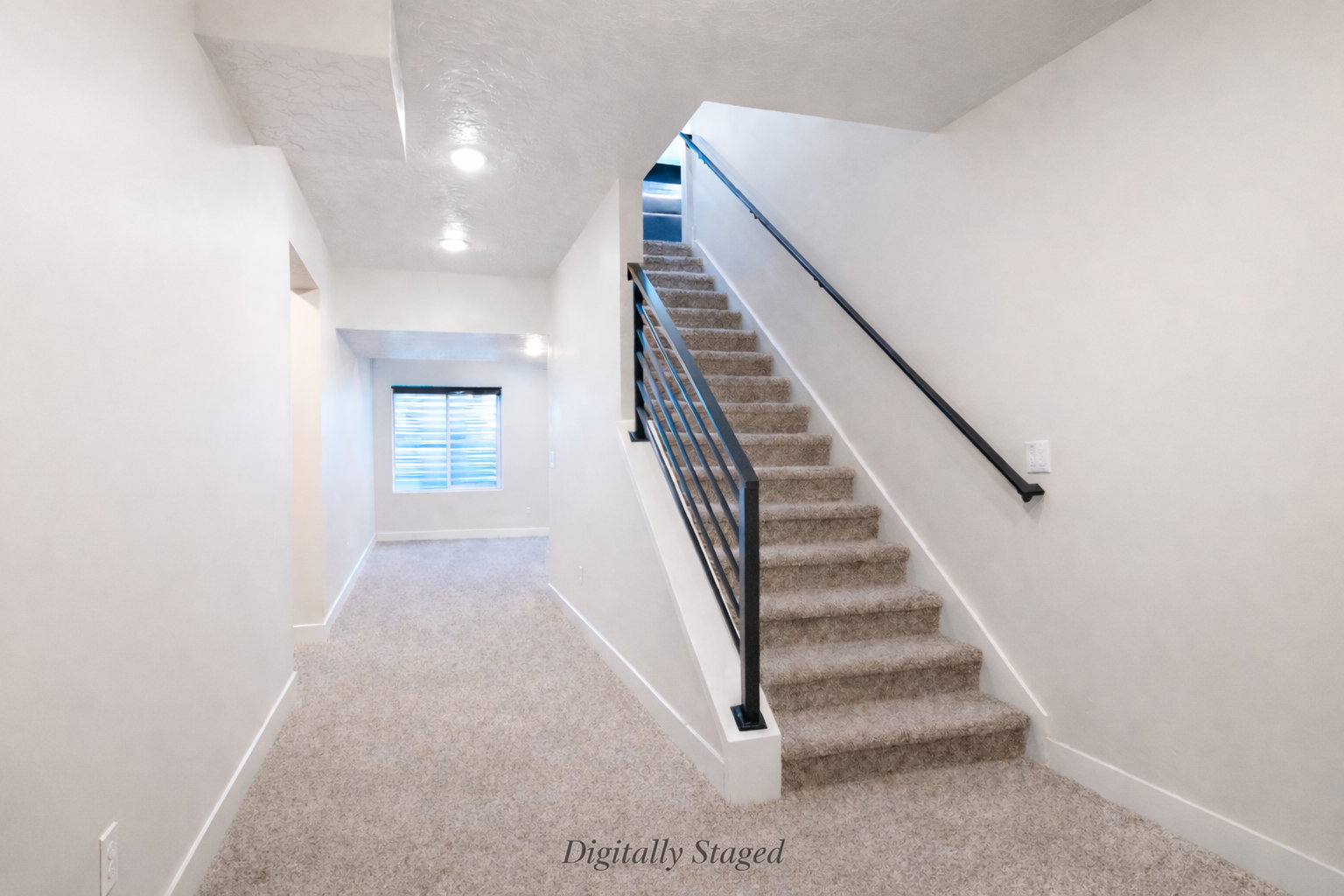 Stairway with carpet flooring and baseboards