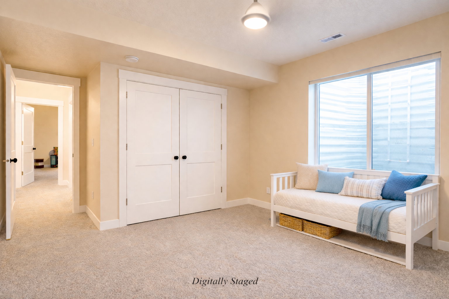 Sitting room with light colored carpet