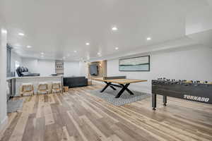 Rec room featuring recessed lighting and light wood-type flooring