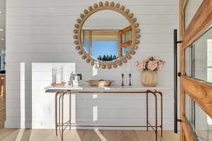 Detailed view of wood finished floors and wood walls