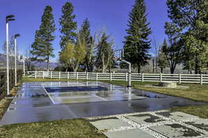 View of property's community with community basketball court and a patio