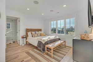Bedroom featuring light wood finished floors and recessed lighting