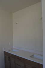 Full bathroom with double vanity