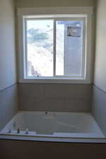 Bathroom with a garden tub
