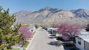 View of asphalt street with a mountain view