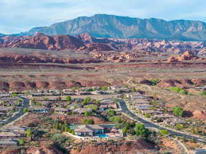 Aerial view of residential area with a mountain backdrop
