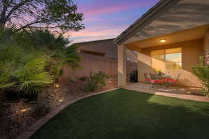 Fenced yard featuring a patio and outdoor dining area