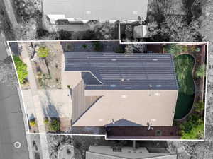 Aerial view of property and surrounding area with property parcel outlined