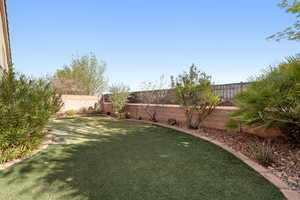 View of fenced backyard