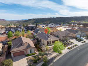 Aerial perspective of suburban area with mountains