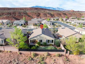Aerial view of residential area with a mountainous background