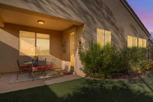 View of patio with outdoor dining area