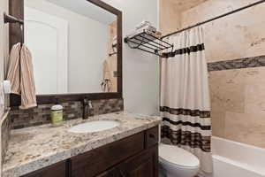 Full bathroom featuring vanity, shower / bath combination