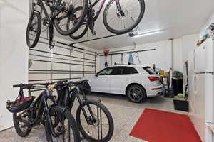 3-car garage with epoxy coated floors