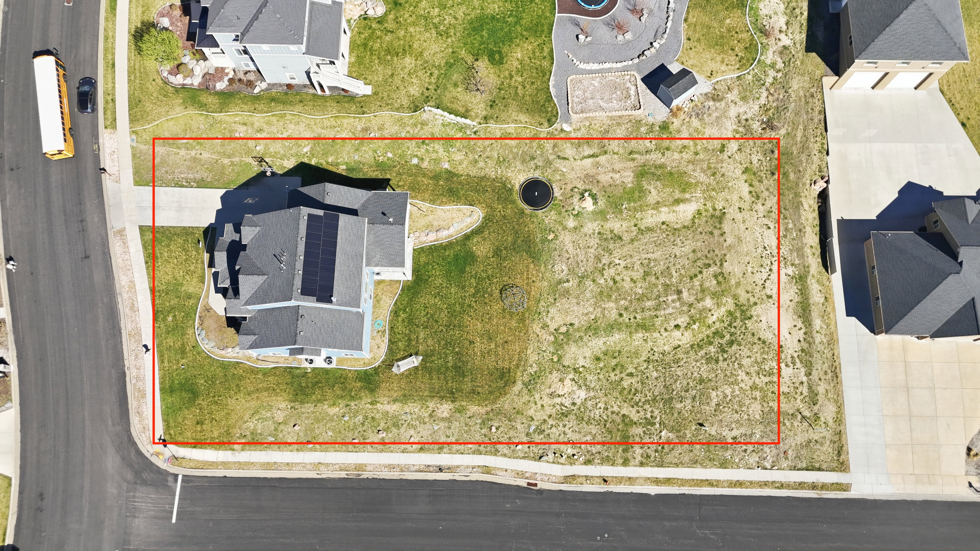 Aerial view highlighting the property's corner lot position.  Estimate only...buyer to verify exact property pin locations.