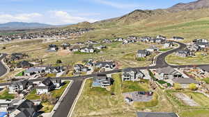 View of property location with nearby suburban area and a mountainous background