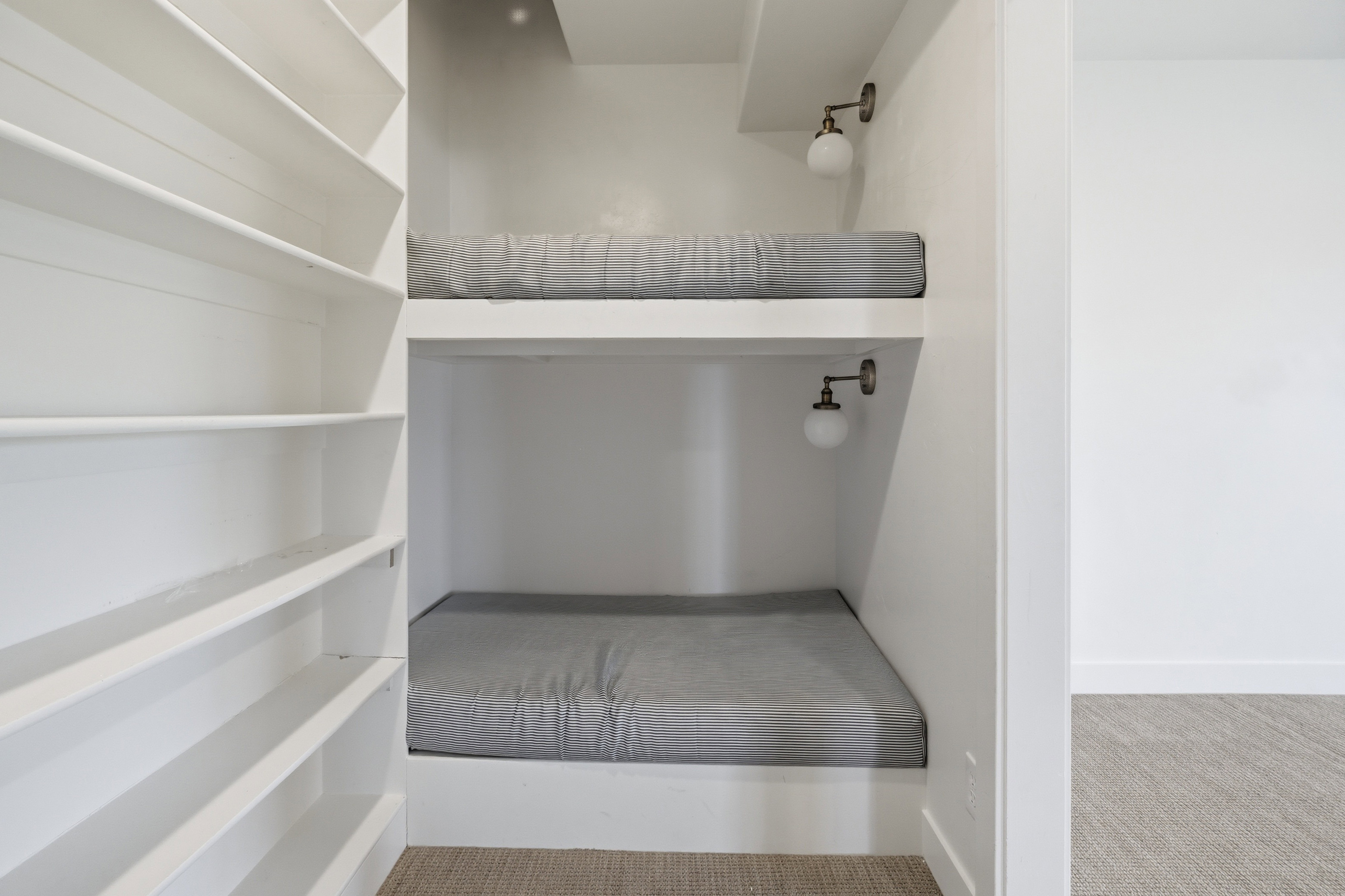 Play area with book storage and reading nooks