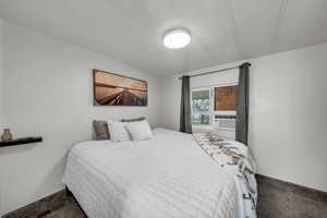 Bedroom featuring carpet flooring