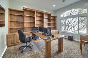Carpeted office featuring baseboards and recessed lighting