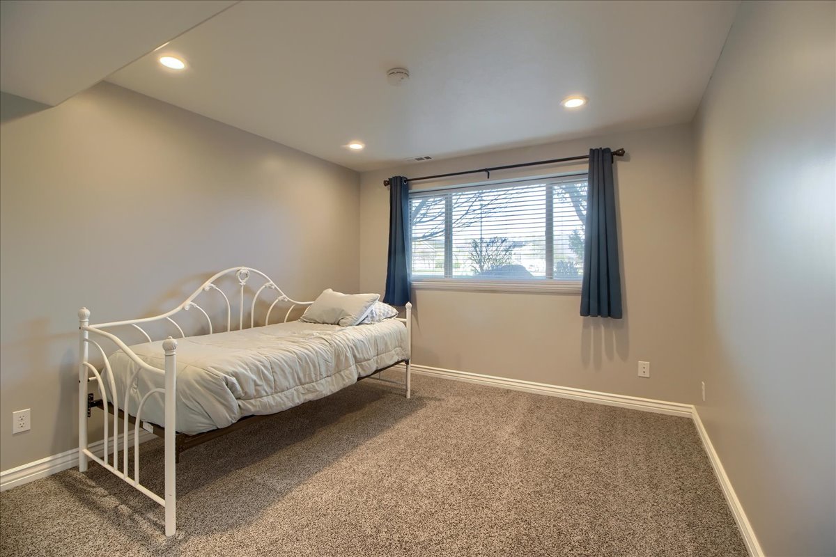 Bedroom featuring carpet floors and recessed lighting