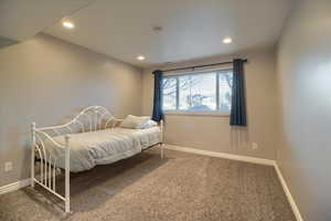 Bedroom featuring carpet floors and recessed lighting
