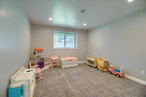 Rec room with carpet floors and recessed lighting
