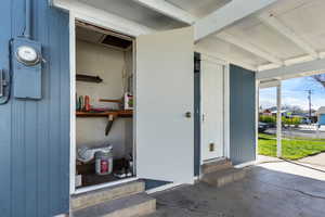 Entrance to property featuring a porch