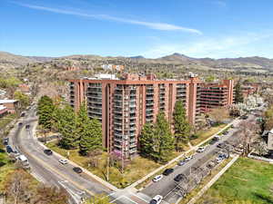 View of apartment building / complex featuring a mountain view
