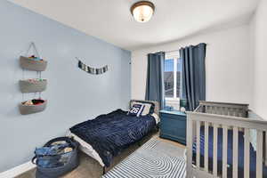 Bedroom featuring carpet