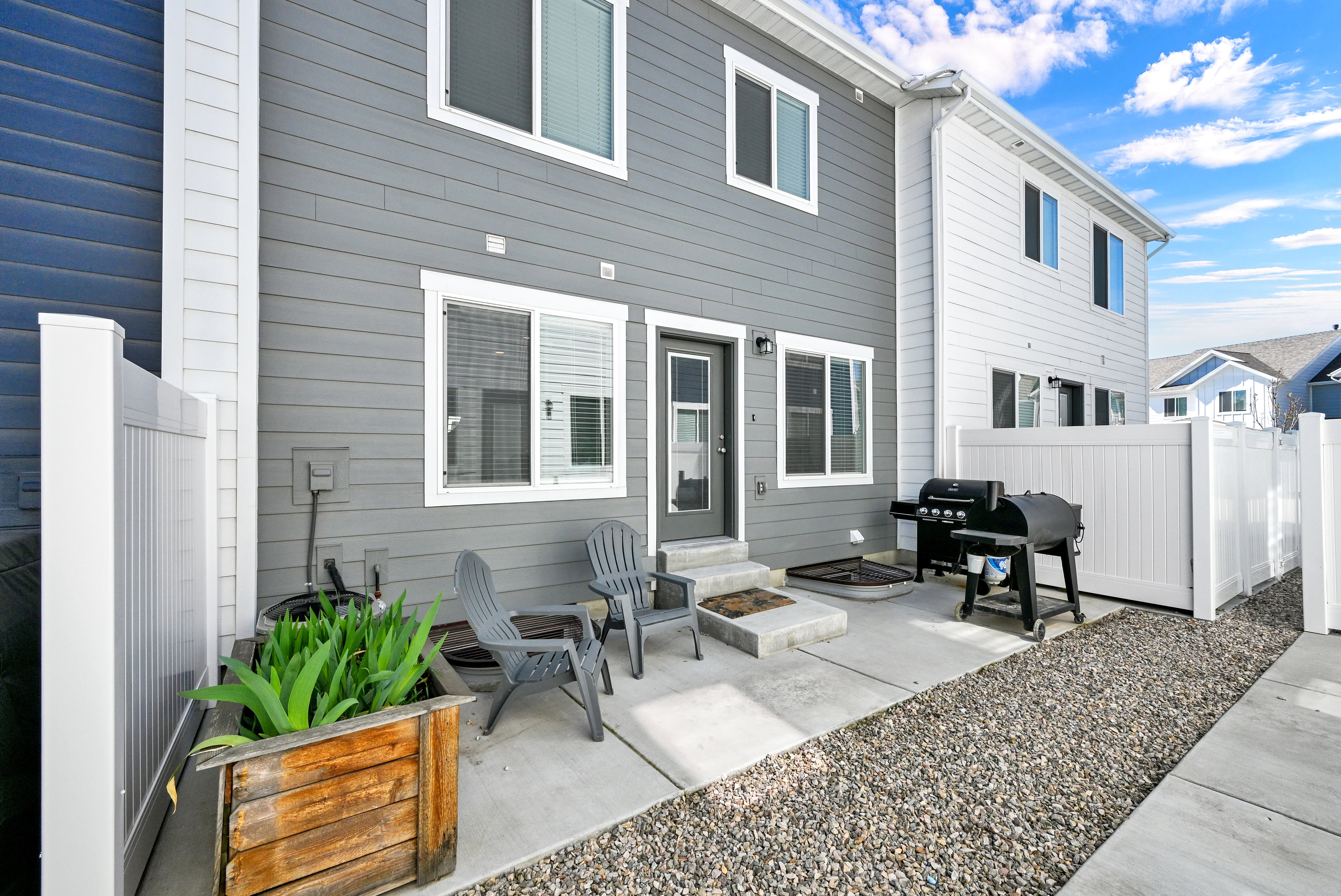 Rear view of property featuring a patio